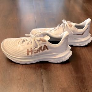 Hoka Mach 5 white running shoes with copper-gold trim